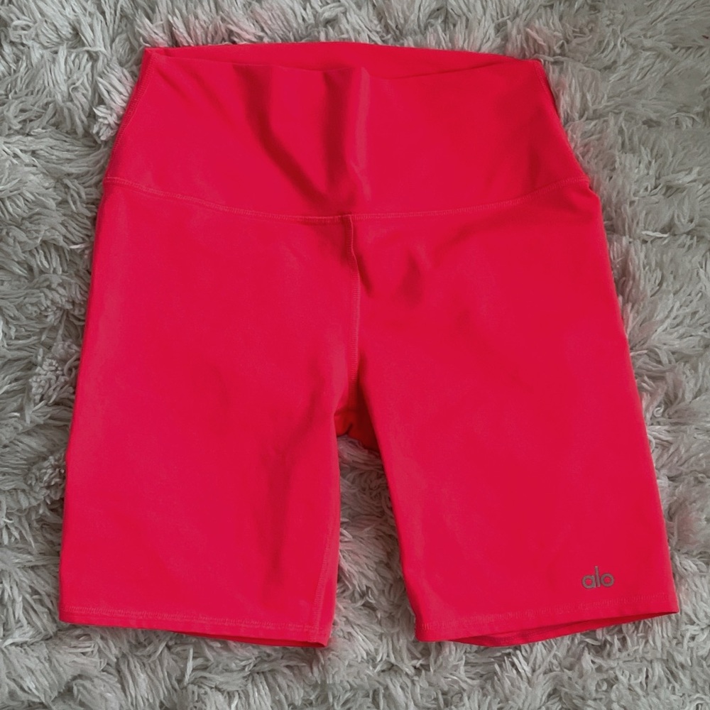 Neon Pink alo biker shorts.